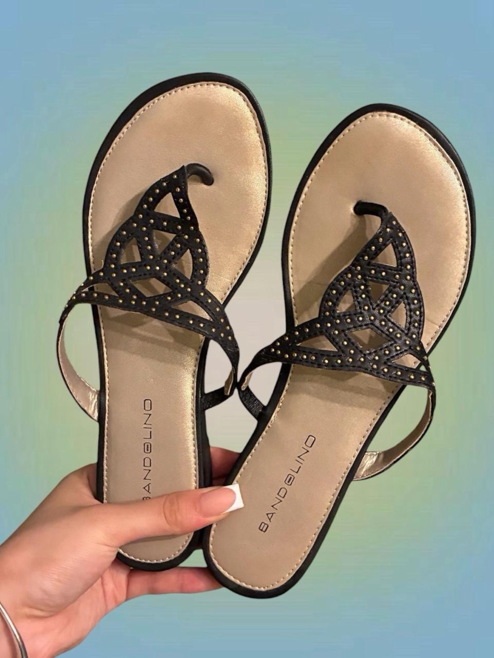 Bandolino Black and Gold Flat Toe-Loop Sandals